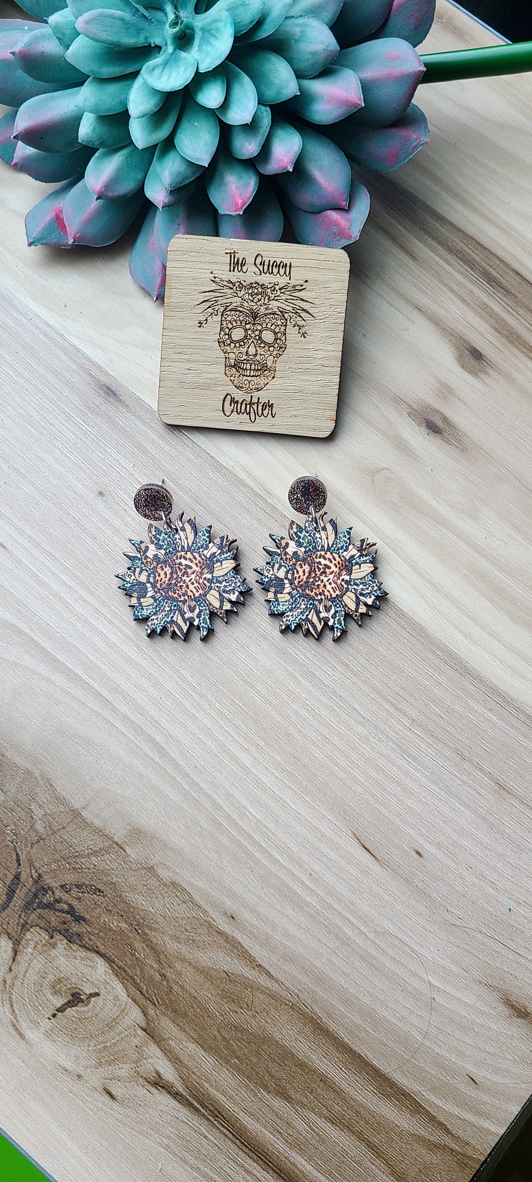 Wooden leopard and blue sunflower