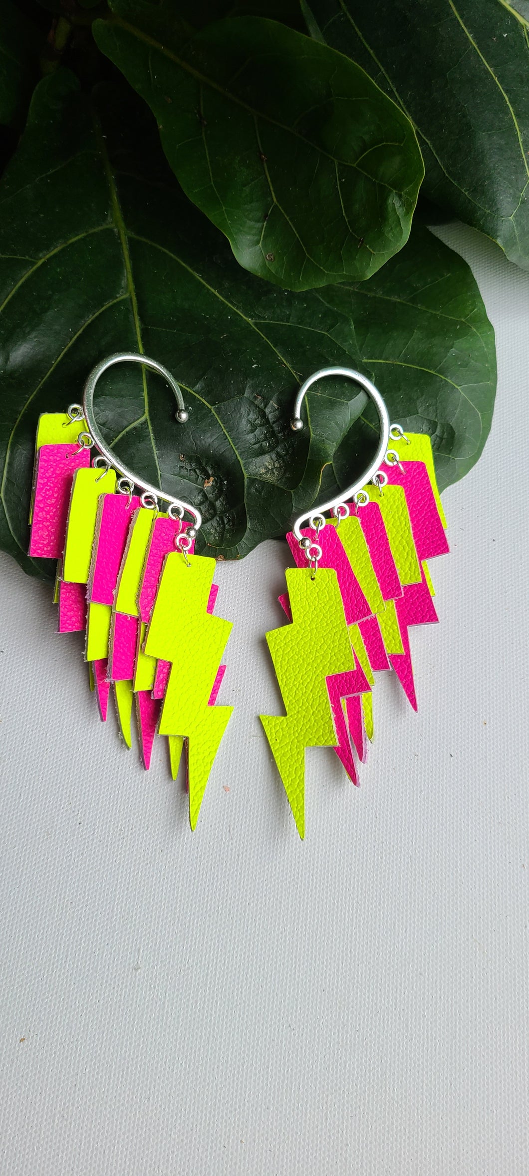 Ear cuff with neon lightning bolts