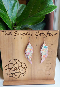 Feathers in boho pumpkins and pink sparkle
