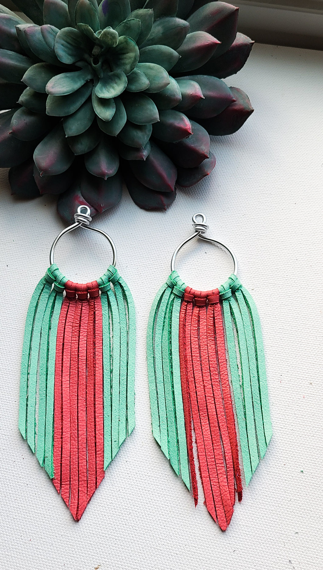 Sea green and coral fringe