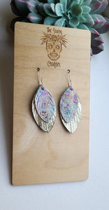 Gold and rainbow paisley feathers